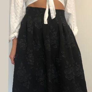 Black skirt flower pattern fabric